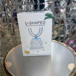 U-Shaped Ultrasonic Toothbrush with teeth whitening.